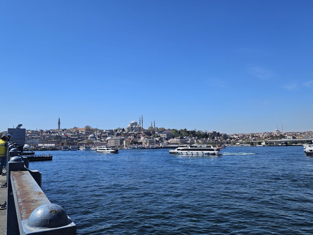 Passenger ferry travelling across the Bosphorus in Istanbul on a clear day.