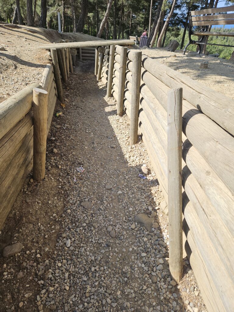 Preserved trench walkway at Gallipoli showing uneven terrain and narrow paths
